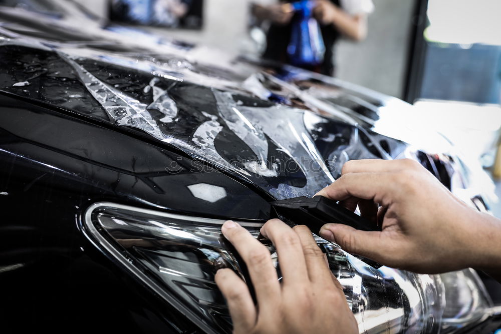 Similar – Image, Stock Photo Mechanic repairing customized motorcycle
