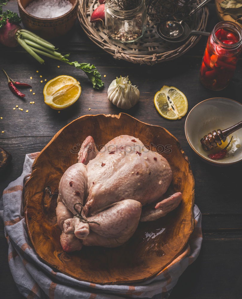 Similar – Whole chicken with cooking ingredients