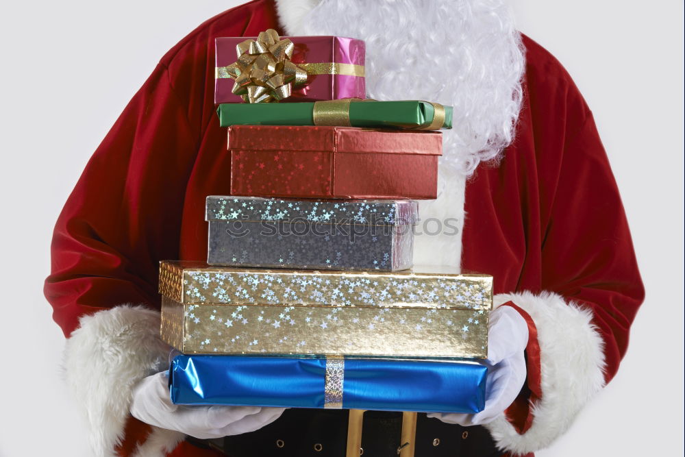 Similar – Young man holding a christmas gift