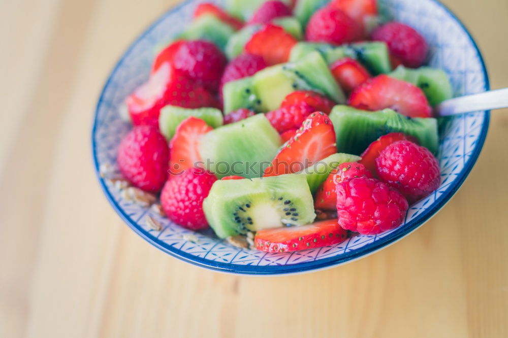 Similar – Image, Stock Photo Crop woman close up eating oat and fruits bowl for breakfast