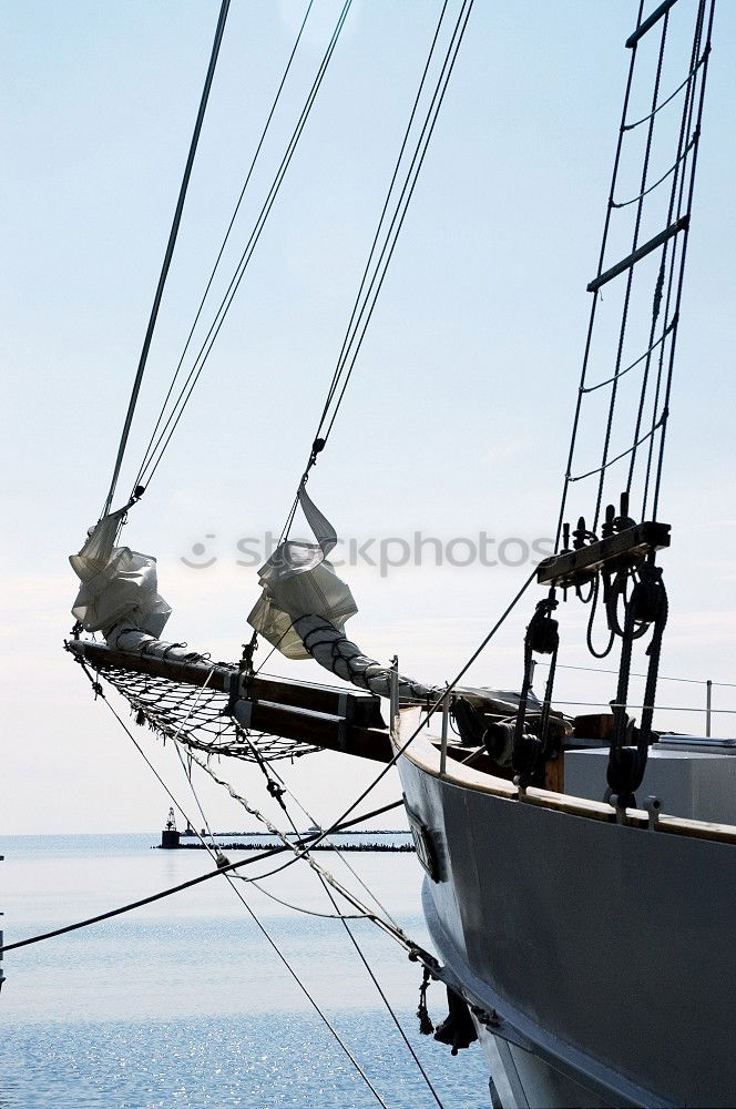 Similar – Fenders suspended between a boat and dockside for protection. Maritime fenders