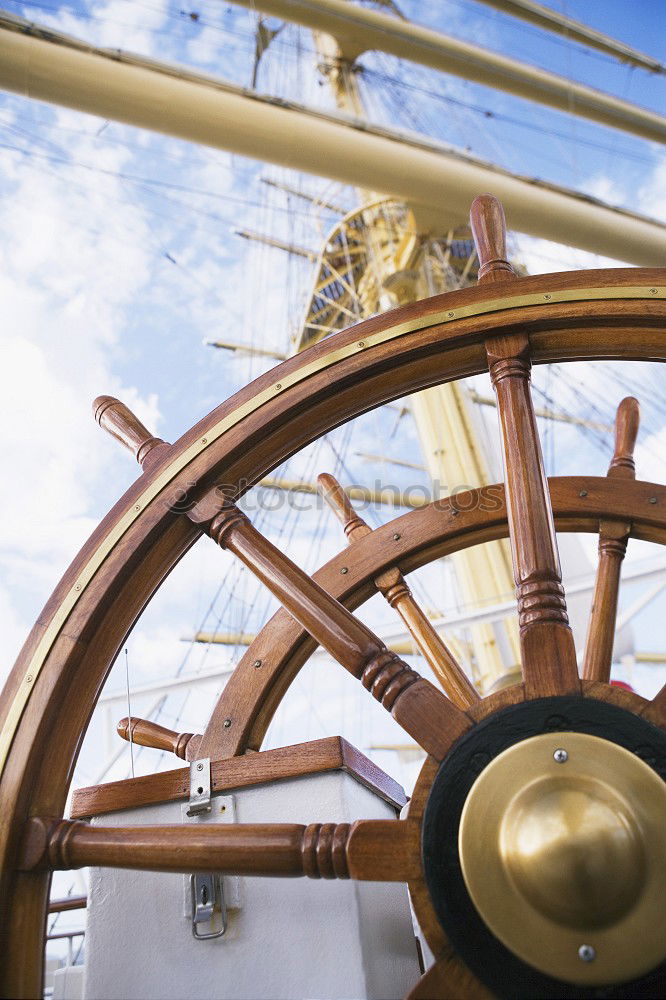 Similar – Steering wheel of a sailing ship