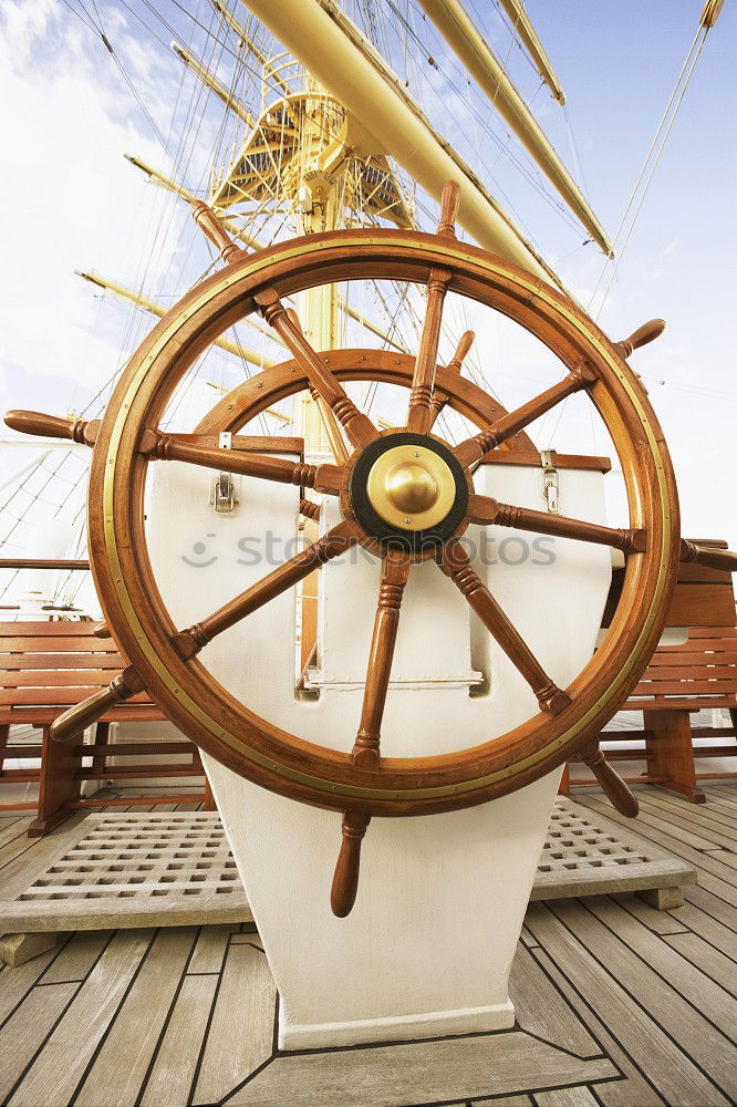 Similar – Steering wheel of a sailing ship