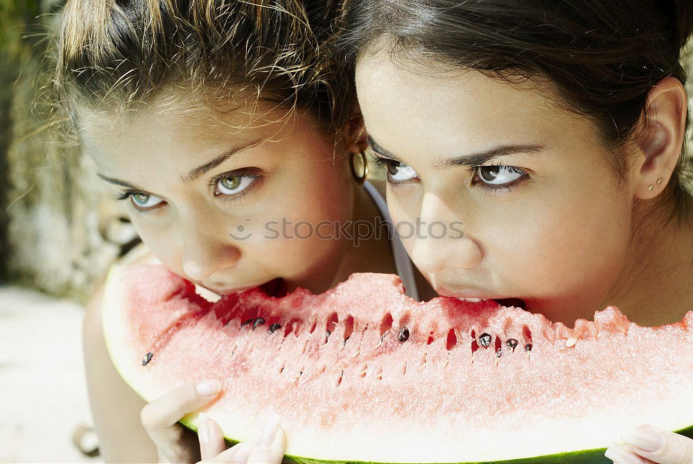 Similar – Image, Stock Photo Woman eating watermelon at the beach in sunset