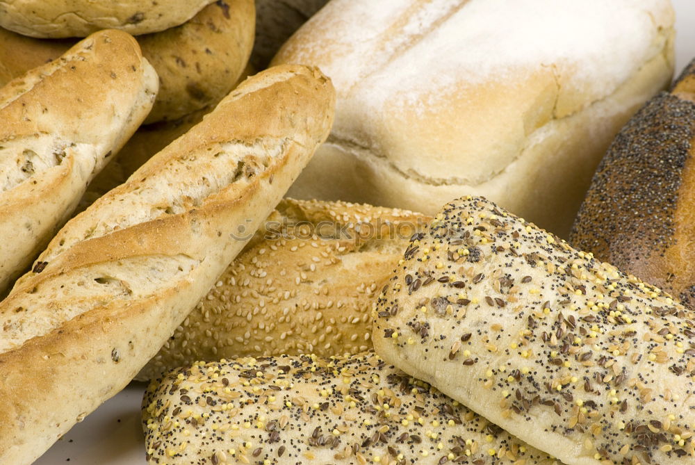 Similar – Many mixed breads and rolls.