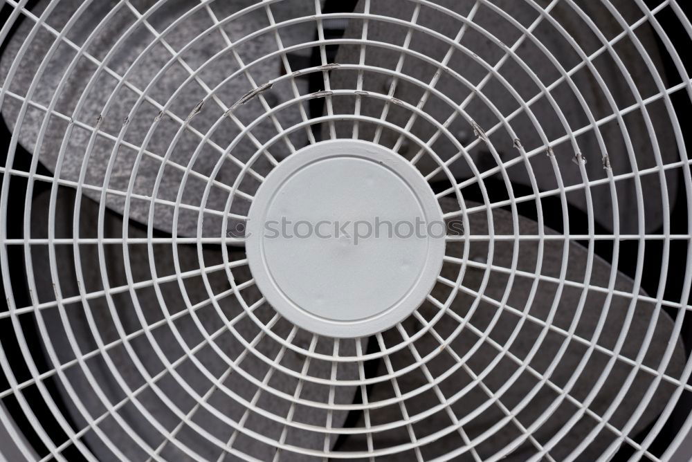 Similar – close up of air conditioner texture. Air condition cover texture. Gray protective plastic cover for air conditioner fan. Detail of industrial equipment. Close-up, abstract background, lattice pattern