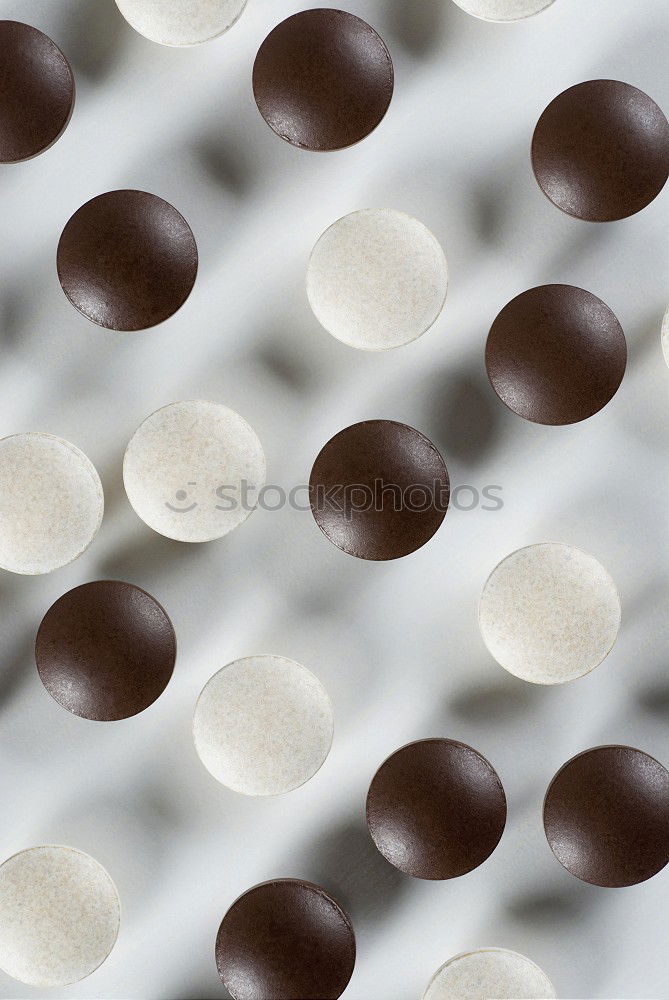 Similar – Dot on chocolate Candy