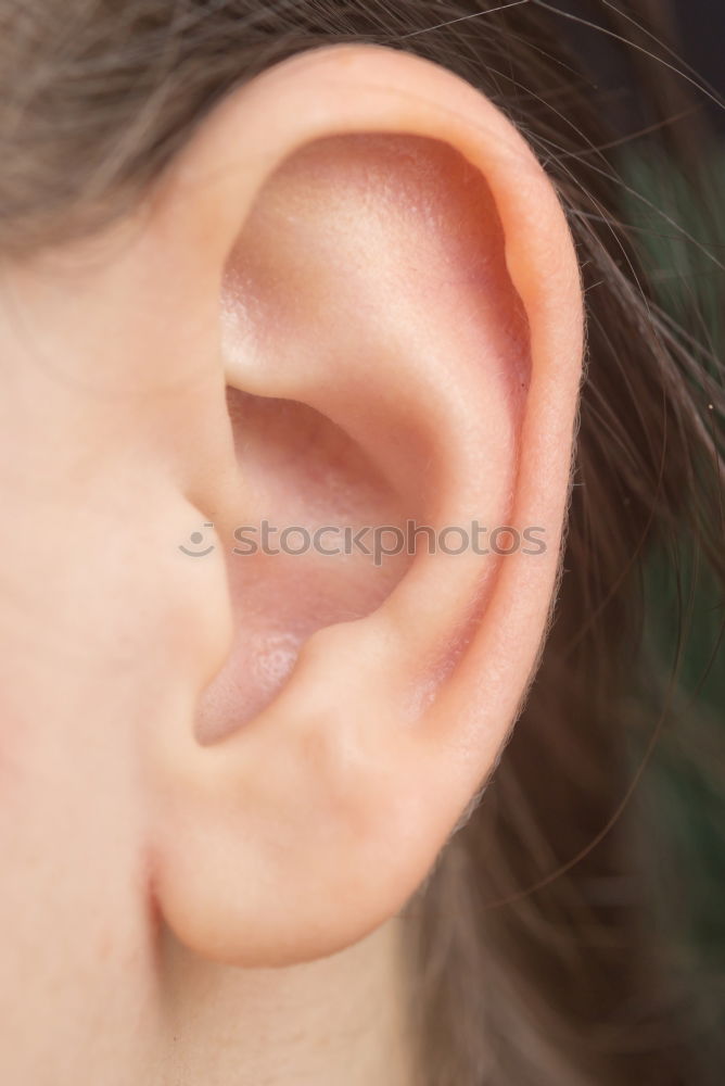 Similar – Image, Stock Photo Person with piercing and earphones