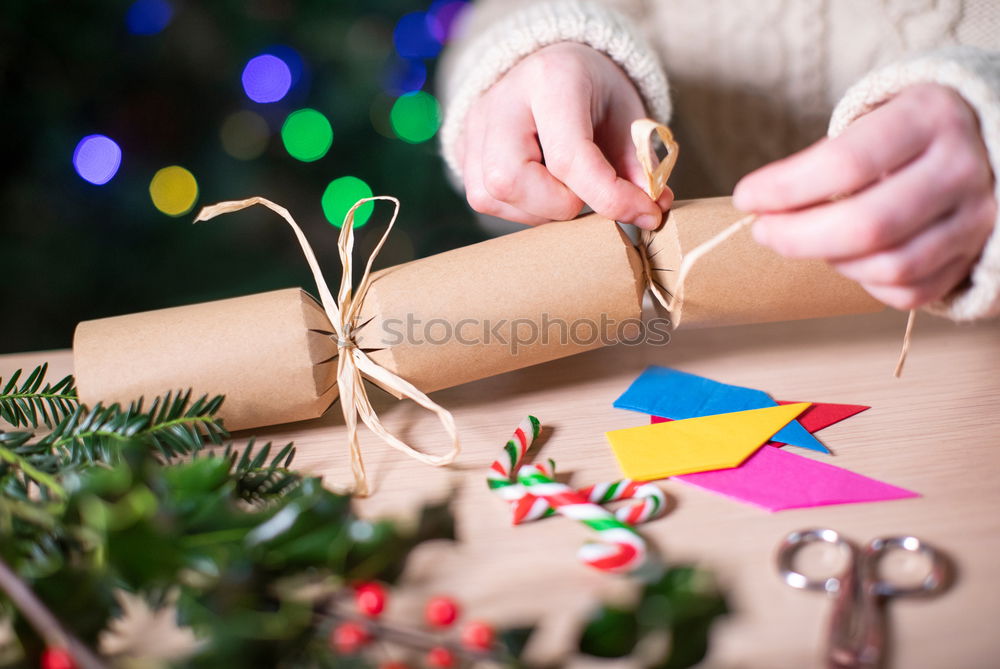 Similar – Image, Stock Photo Girl making Christmas tree decoration from paper