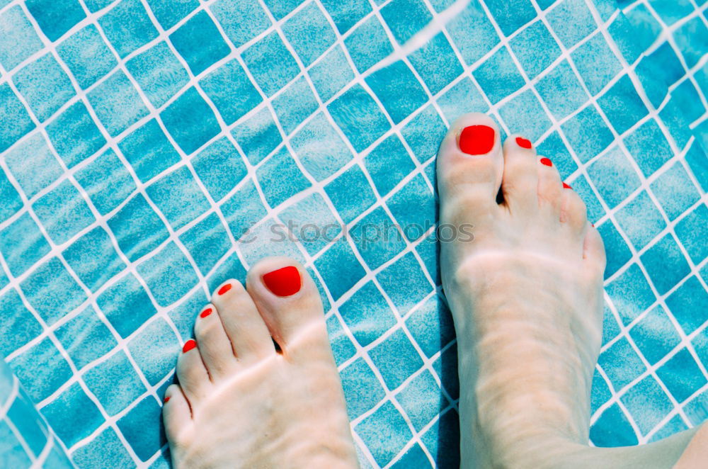 Similar – Man feet in the pool water