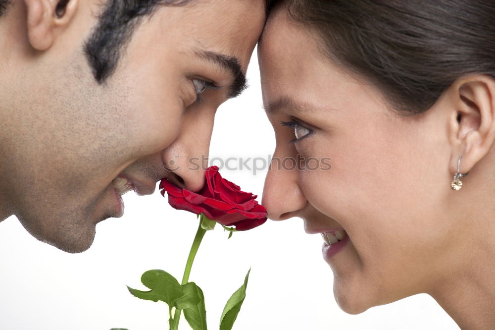 Similar – Image, Stock Photo Happy couple in love with a rose on the street