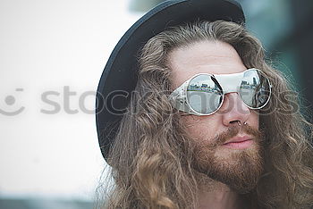 Similar – Bearded man in hat on road