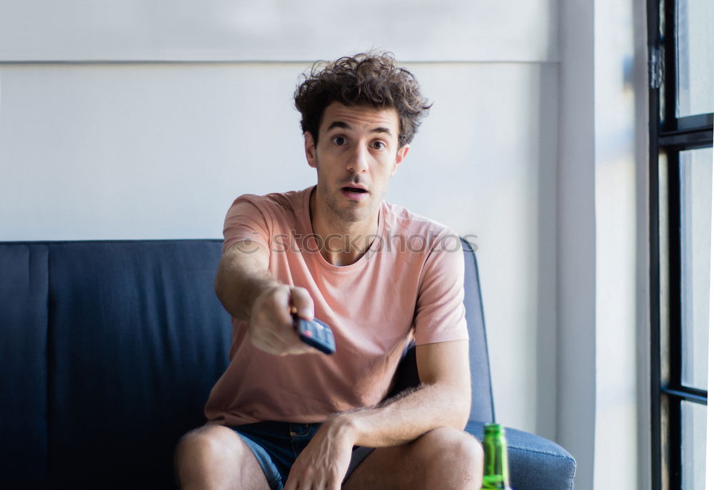 Similar – Image, Stock Photo Portrait of a young thoughtful mixed race man sitting in the sofa