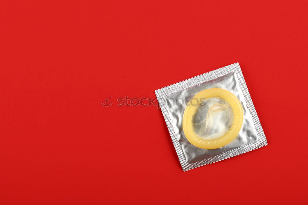 Image, Stock Photo Close up one condom pack over red background