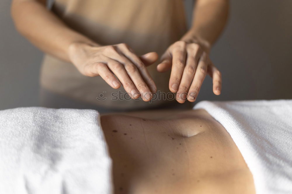 Similar – Neck massage, hands close-up