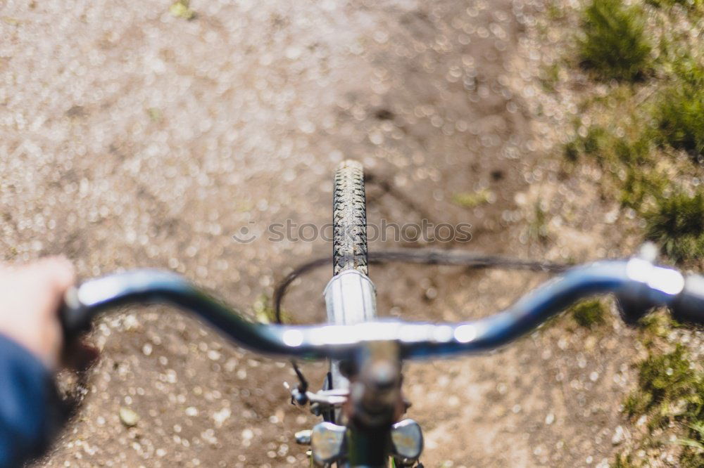 Similar – Image, Stock Photo close up view of Cyclist glove and handlebar.Sports