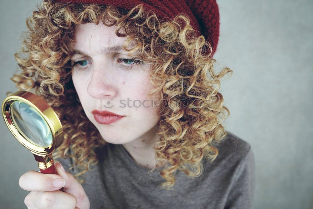 Similar – Image, Stock Photo young funny woman investigating with a magnifying glass