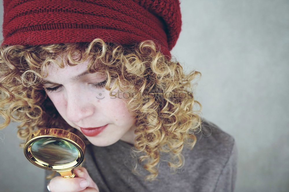 Image, Stock Photo young funny woman investigating with a magnifying glass