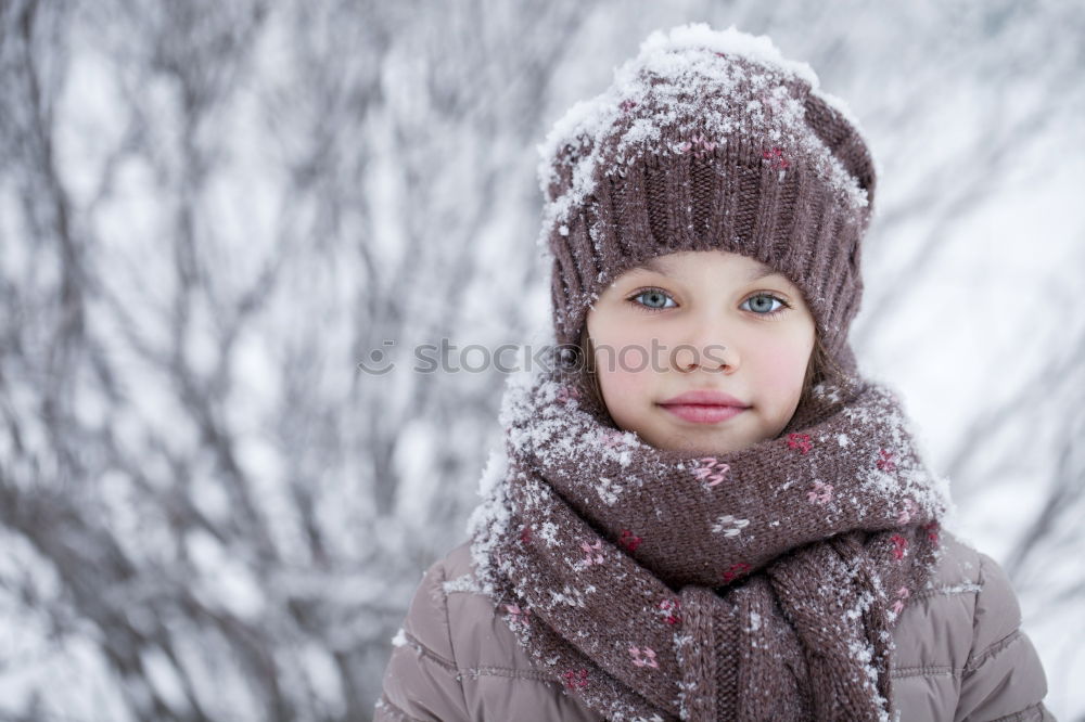 Similar – happy child girl skiing in winter snowy forest