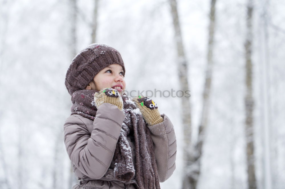 Similar – Image, Stock Photo Young woman enjoying a snowy winter day