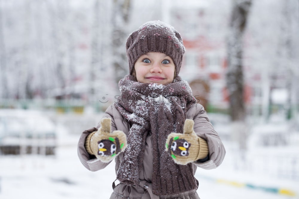 Similar – happy child girl skiing in winter snowy forest