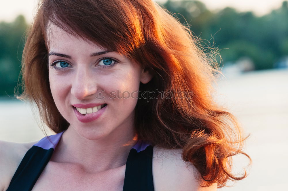 Similar – Redhead woman with blue shirt in a beautiful park