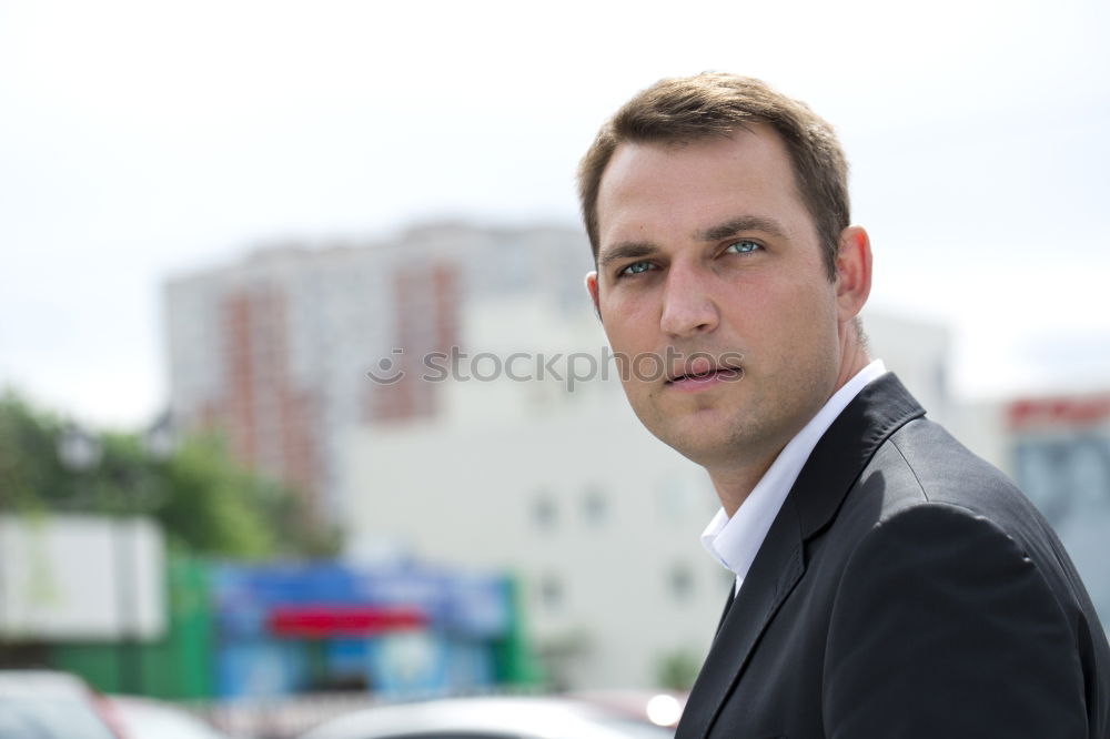 Similar – Young handsome confident fashionable man standing in an urban street