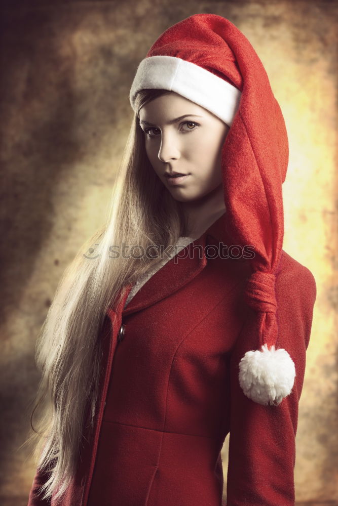 Similar – Portrait of a female shop mannequin with a Christmas Santa hat on her head.