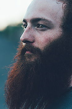 Similar – Bearded man in hat on road