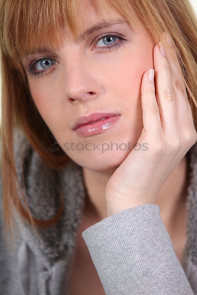 Similar – young woman with bun, forehead fringes and scarf