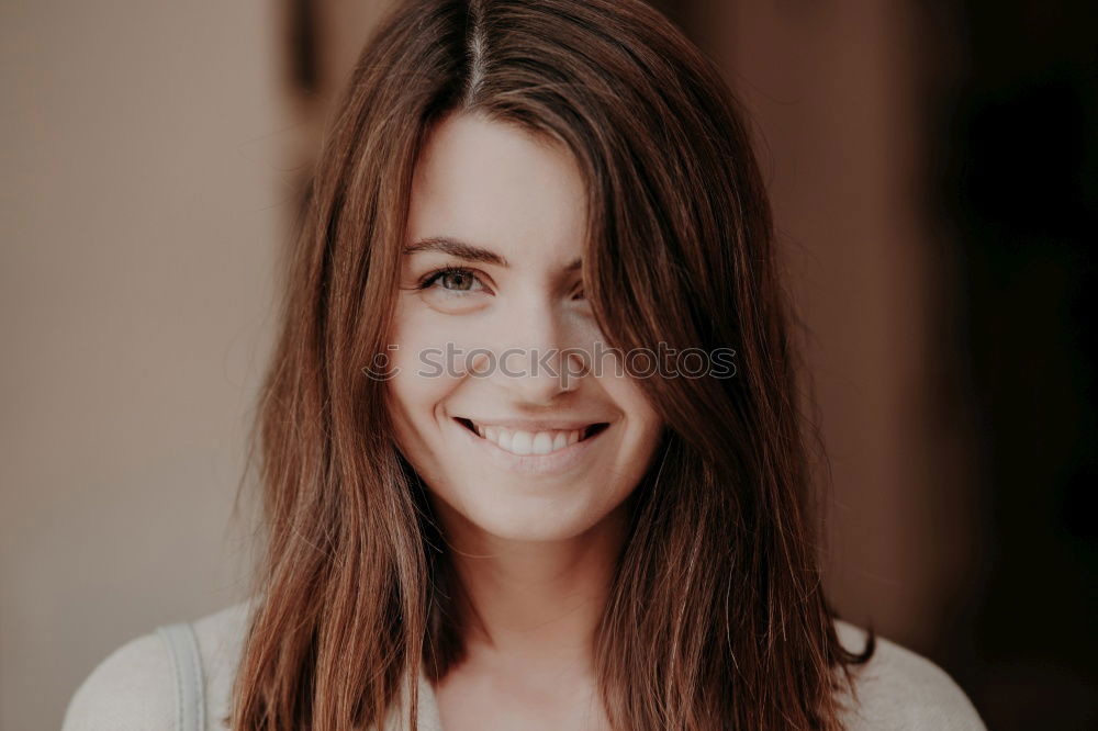 Similar – Young woman smiling in urban background