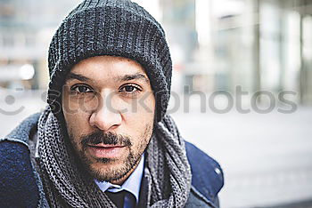 Similar – young mulatto man in casual clothes in urban environment