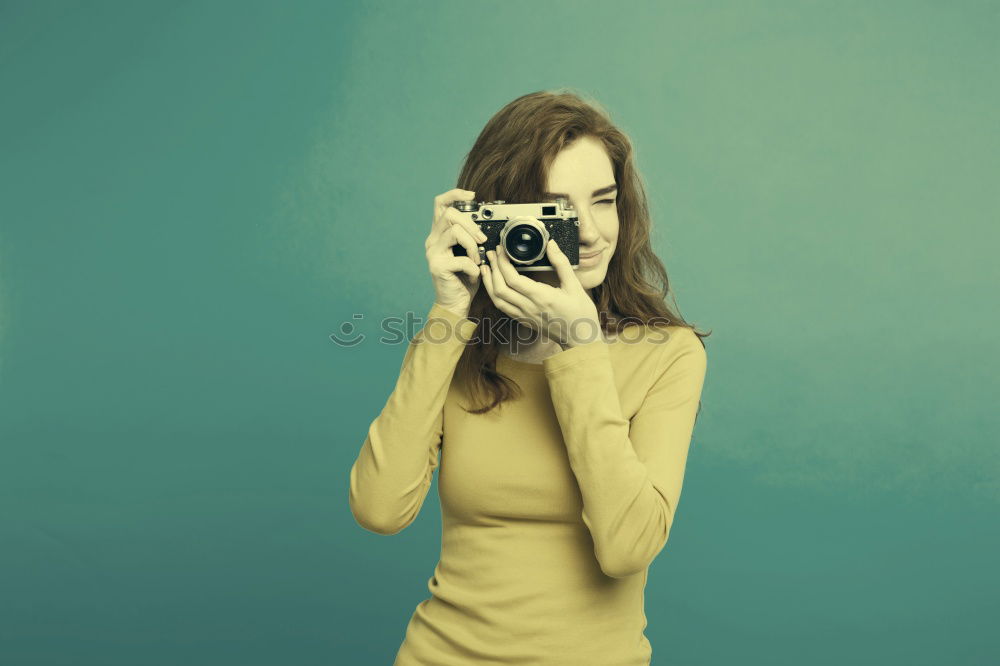 Similar – Image, Stock Photo Young woman taking a self portrait with her mobile phone