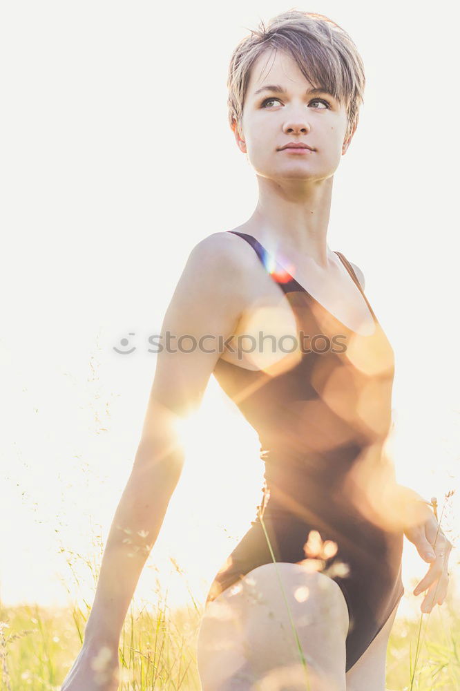 Similar – Woman Meditating And Practicing Yoga, Lotus Pose, Padmasana. Meditation On Sunny Autumn Day At Park. Workout Outdoor.