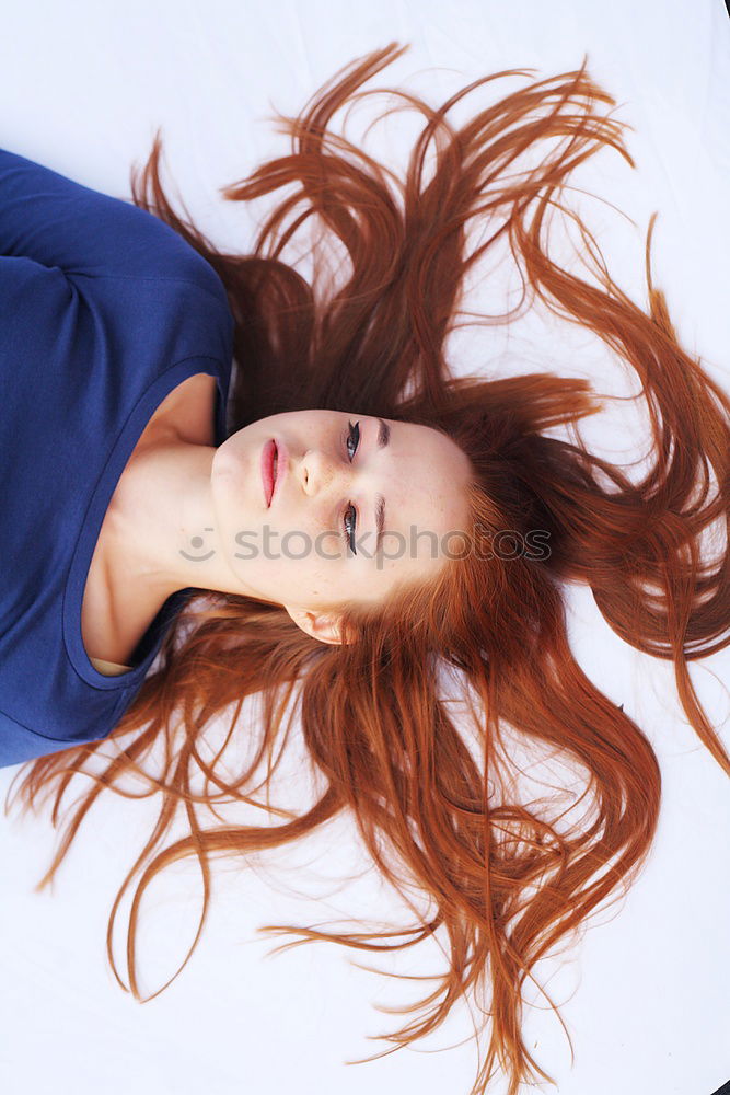 Similar – redhead woman with hat