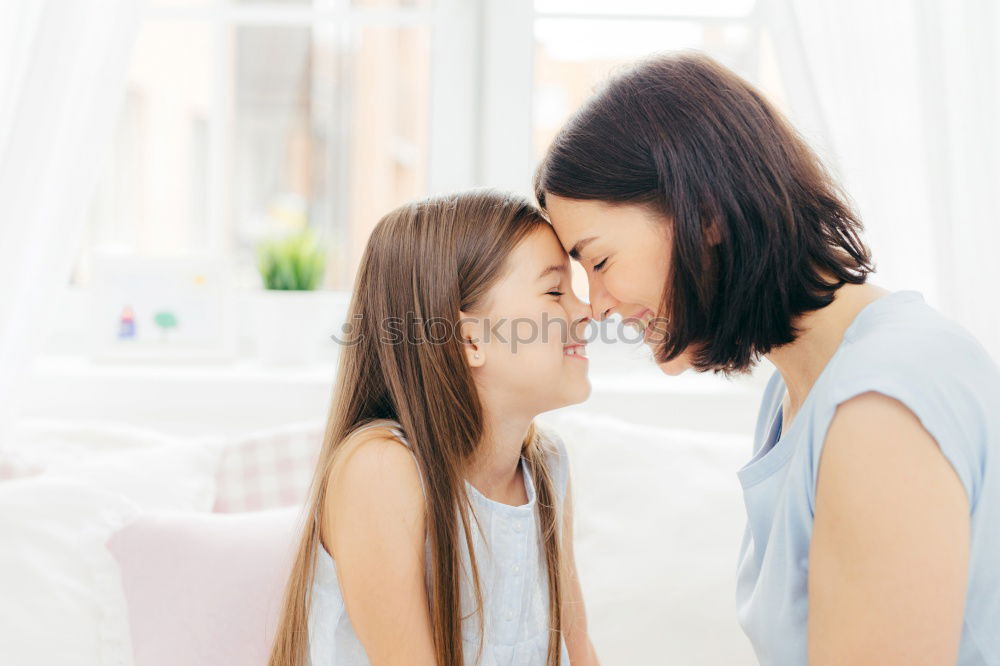 Similar – happy mother hugs her toddler son