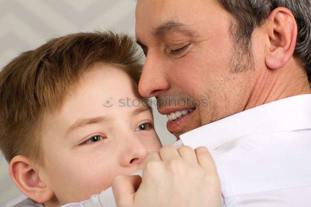 Similar – Image, Stock Photo Father helping son to adjust a bowtie. Preparation before important event