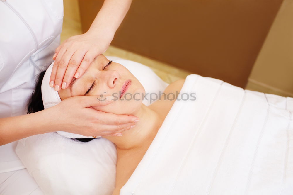 Similar – Image, Stock Photo Woman receiving massage on shoulders in clinical center