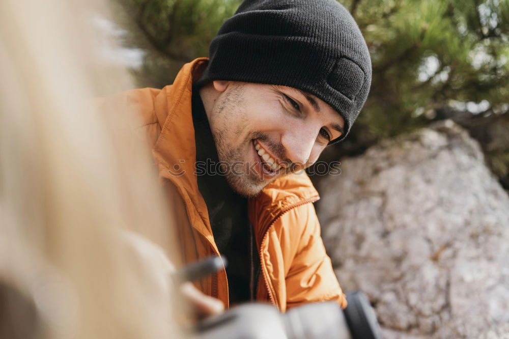Similar – Image, Stock Photo Couple pausing while doing trekking