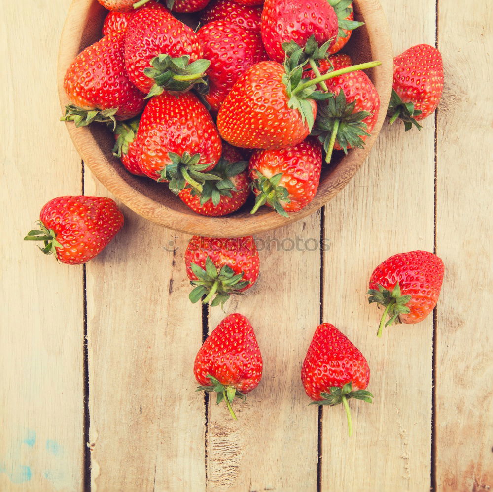 Similar – Strawberries on a wooden board with empty space