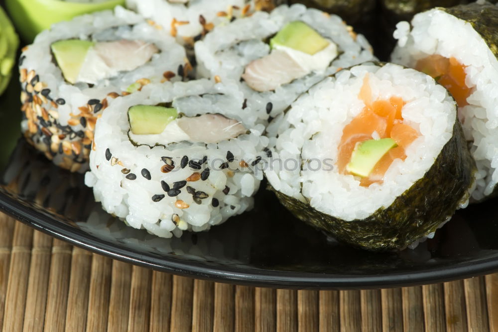 Similar – sushi assortment in white plate and soya sauce