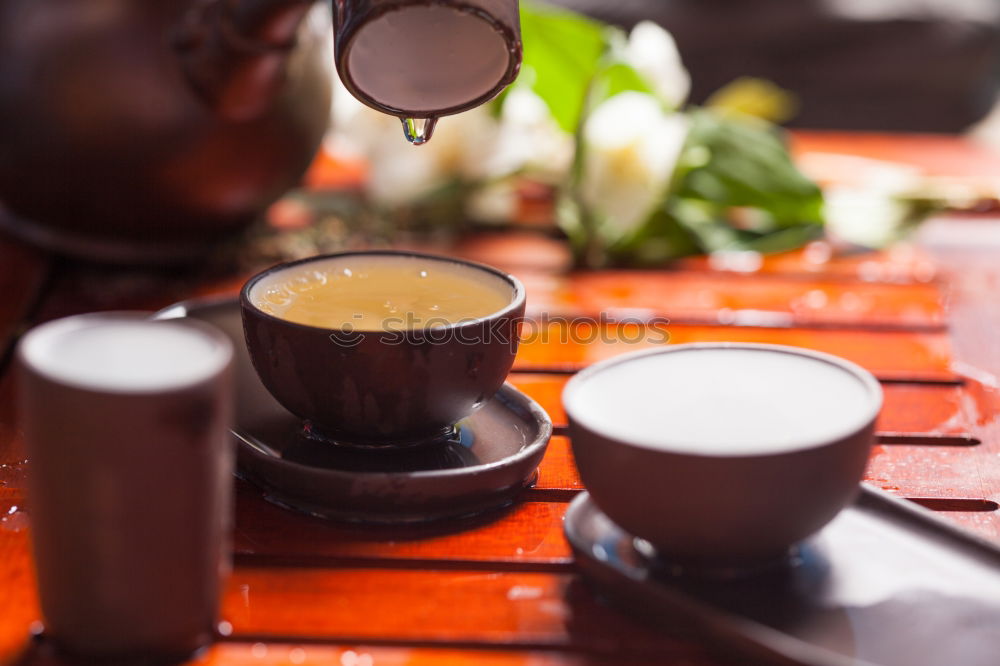 Similar – Cup of coffee on old wooden table with kitchen towel