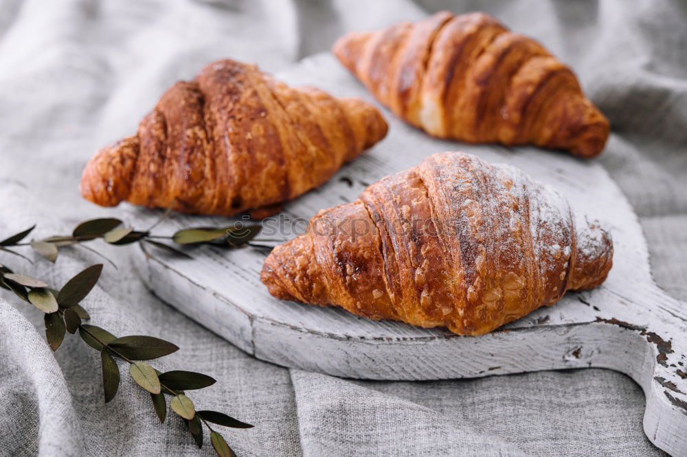 fresh bread and baked goods on wooden