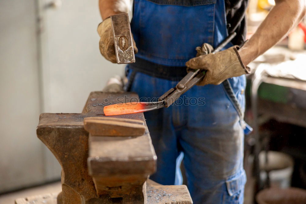 Similar – Image, Stock Photo Carpenter works with a chisel and a hammer.