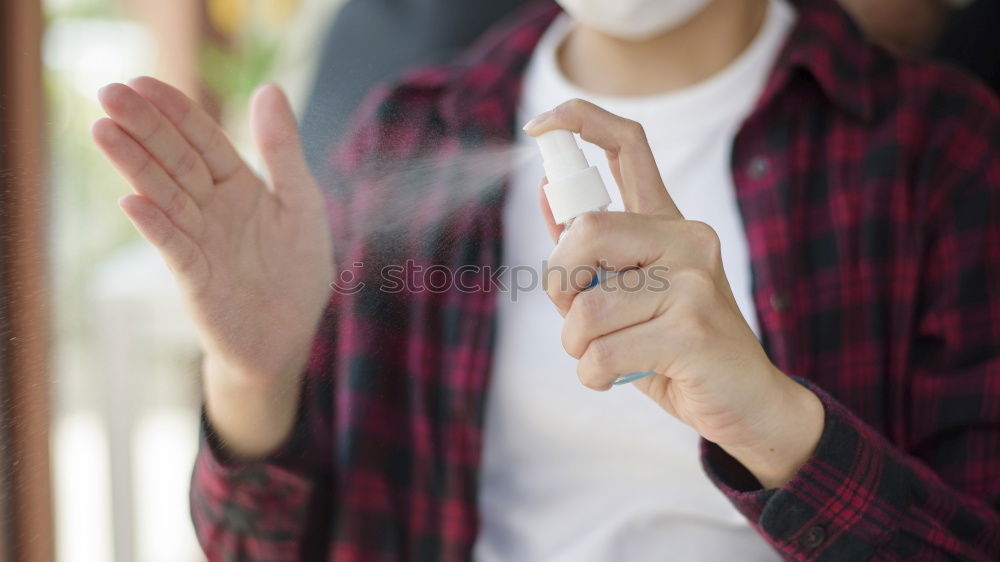 Similar – Young man vaping, studio shot. Bearded guy with sunglasses blowing a cloud of smoke on black background. Concept of smoking and steam without nicotine.