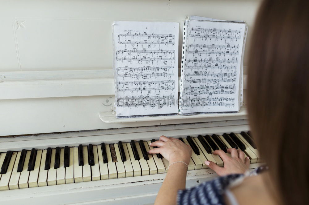 Similar – Image, Stock Photo young woman holding playing piano at home