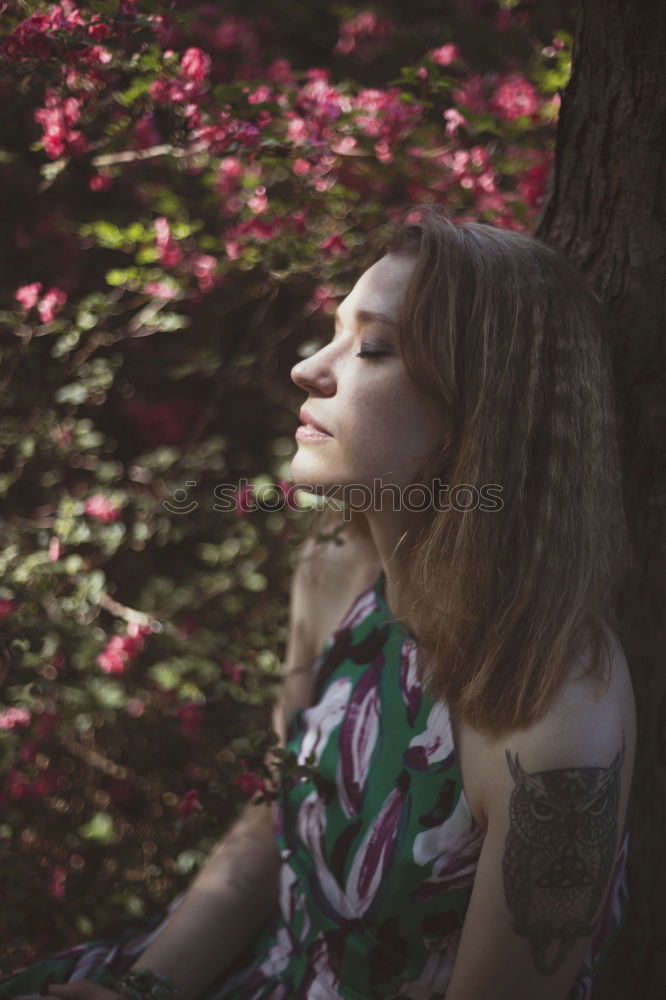 Similar – Image, Stock Photo Young brunette woman next to a plant at home