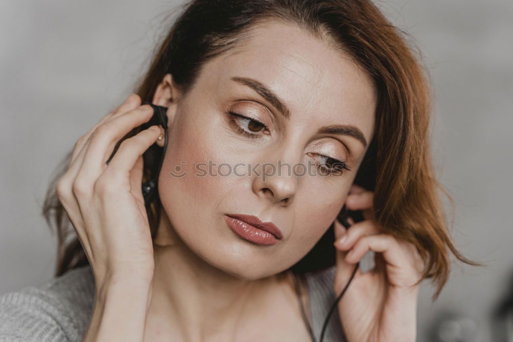 Similar – Crop woman eating sushi