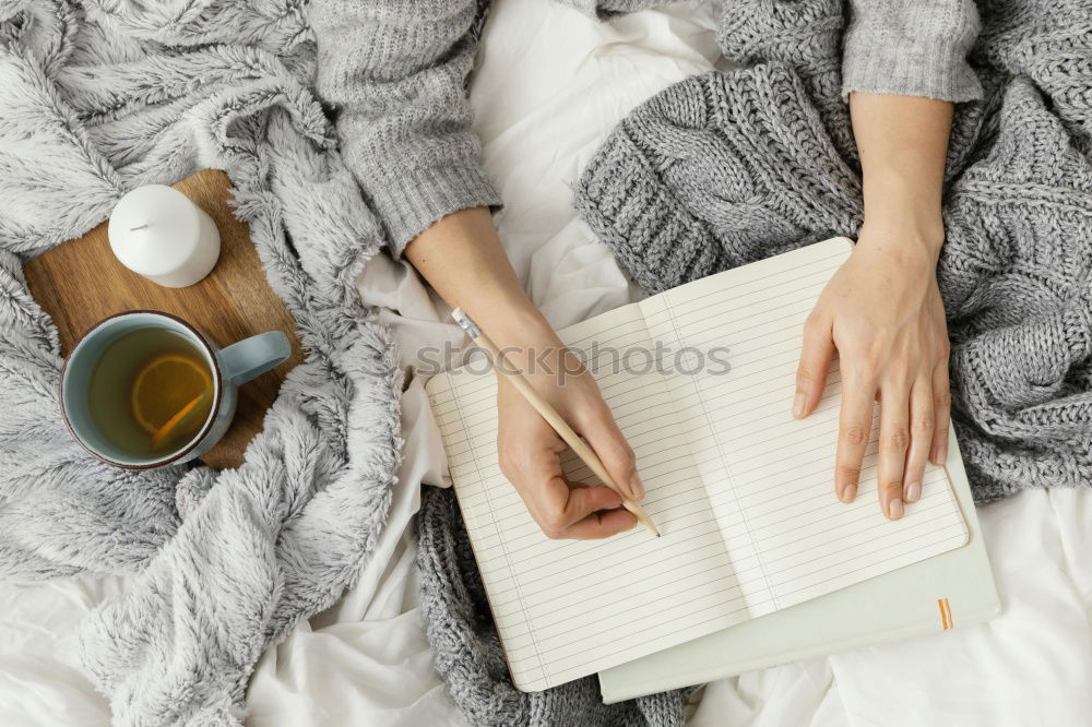 Similar – Image, Stock Photo woman reading a book and drinking coffee on bed with socks