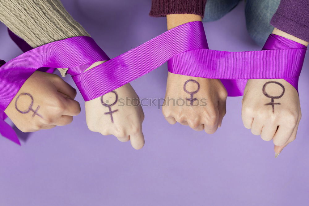 Similar – Young woman with a feminine symbol in her hand